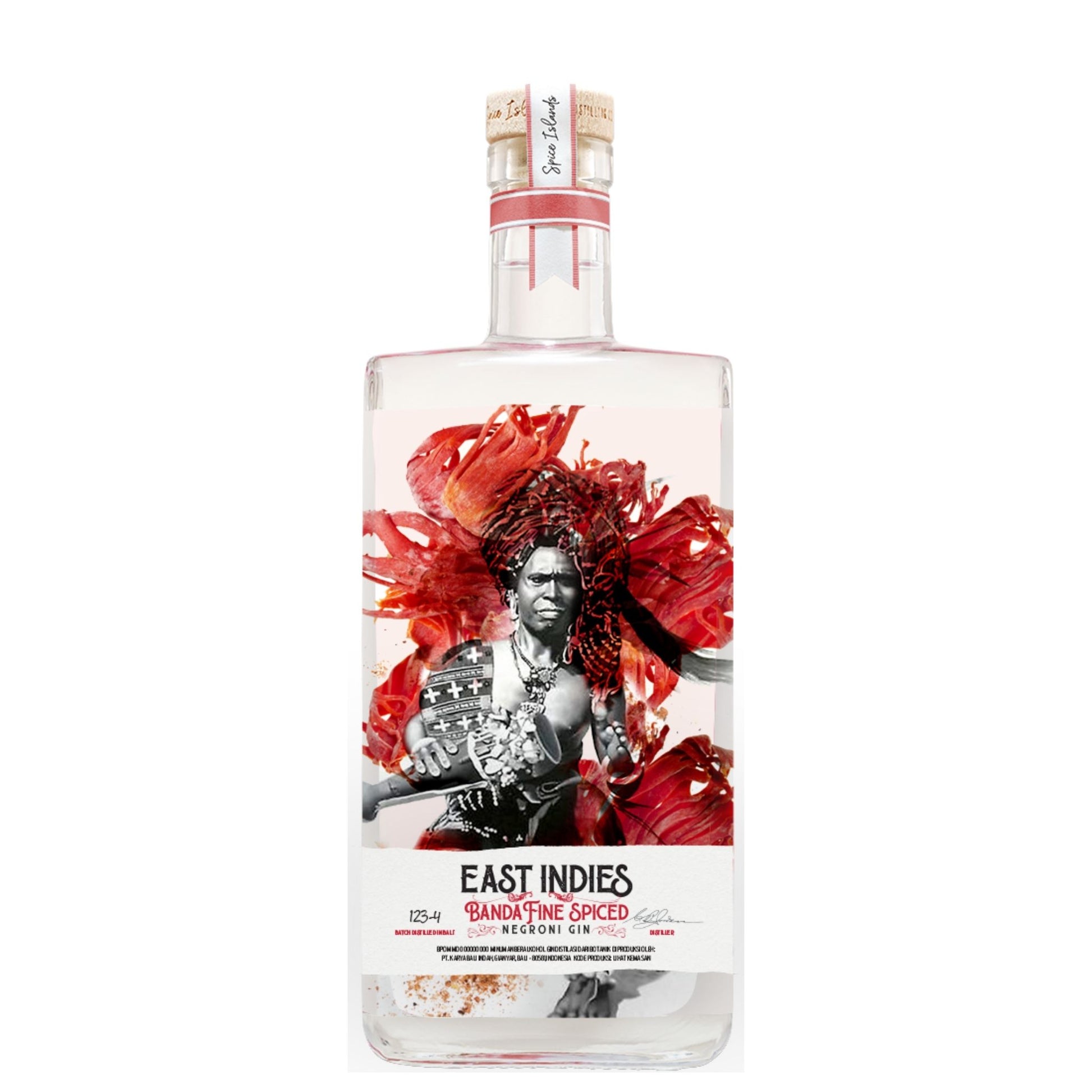 A clear glass bottle of East Indies Band of Fine Spiced Gin with a white label featuring a black-and-white portrait surrounded by bold red abstract floral shapes, on a plain white background.