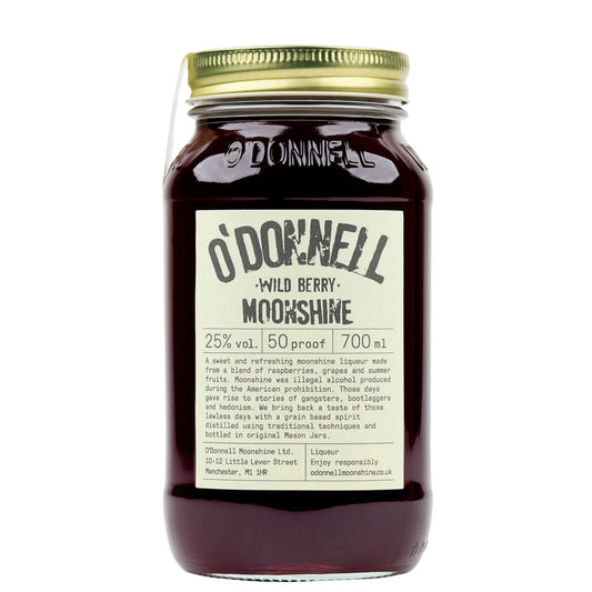 A glass jar of O'Donnell Wild Berry Moonshine liquor with a gold metal lid and a cream-colored label, shown against a plain white background.