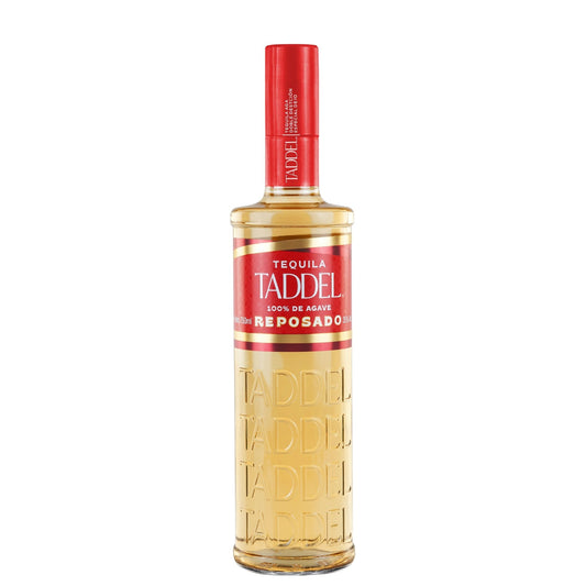 A bottle of Taddel Tequila Reposado on a solid white background. The clear glass bottle shows the golden-amber color of the tequila inside, with a red label and a red screw cap.